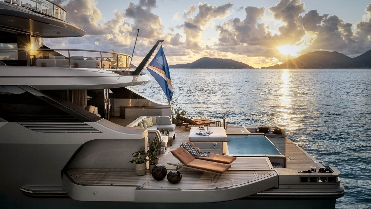 Yacht exterior at sunset.