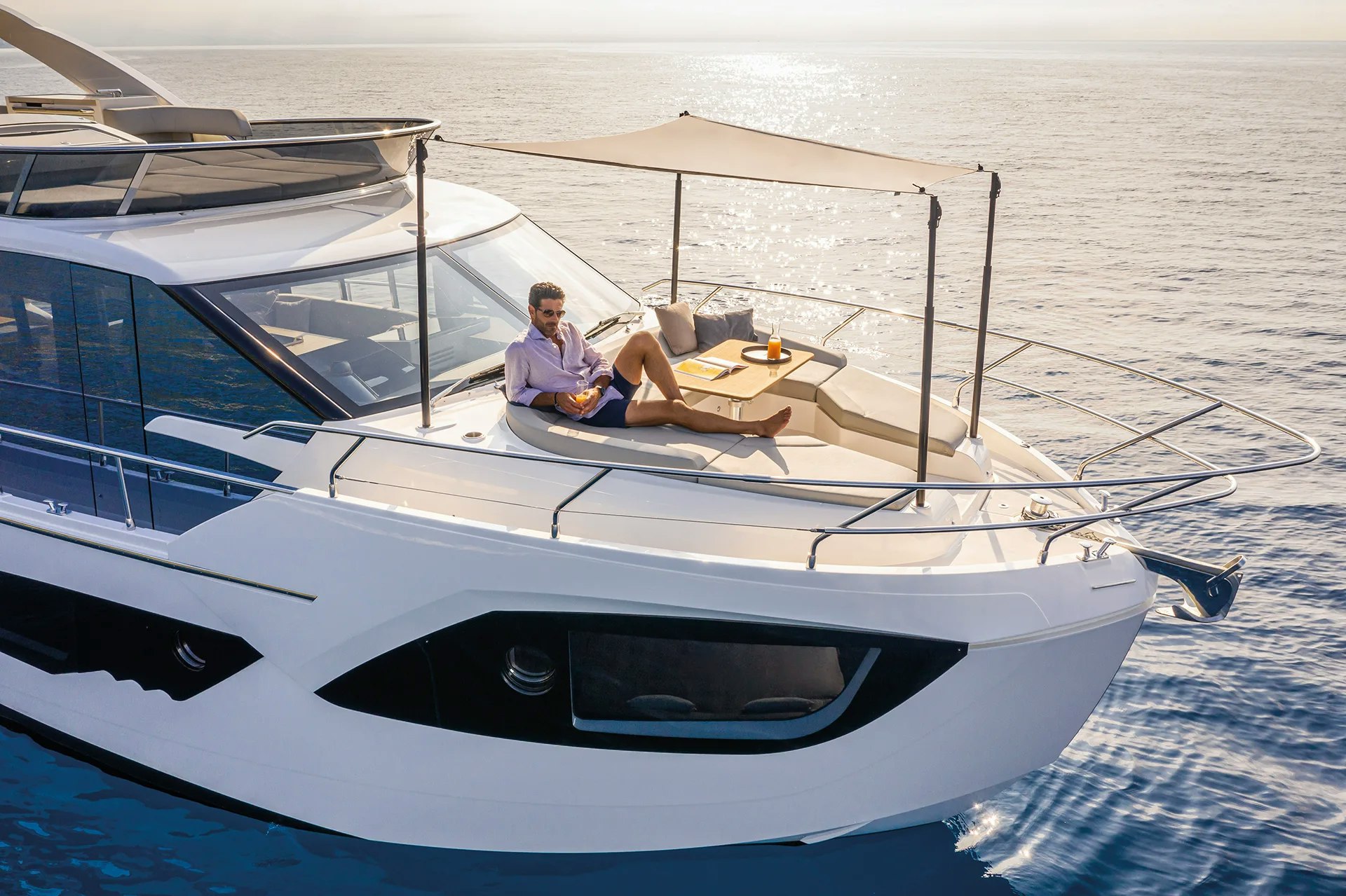 Man relaxing on yacht.